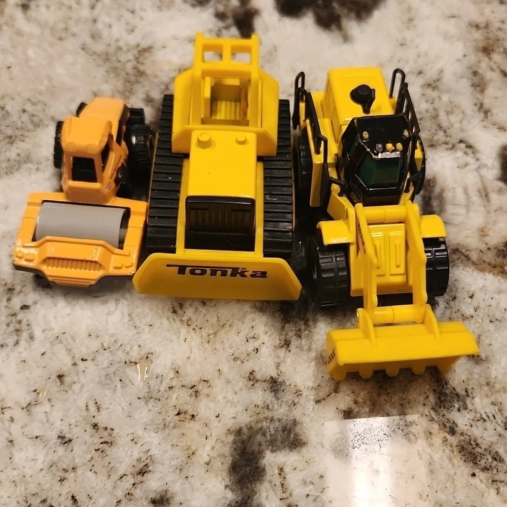 3 construction cars 2 Tonka and 1 road construction